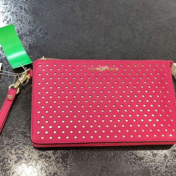 Michael Kors Fuchsia Perforated Wristlet - Picture 1 of 4